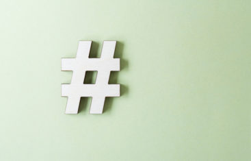 a hashtag on a simple, light green background