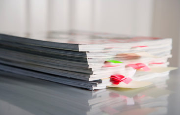 A stack of fundraising and marketing magazines