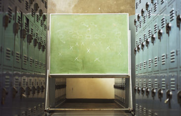 Chalkboard in a locker room depicting a winning P2P strategy